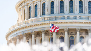 Us Congress Dome Closeup With Background Of Water Fountain Splashing, American Flag Waving In Washington Dc, Usa Closeup On Capital Capitol Hill, Columns, Pillars, Nobody